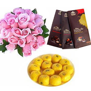 1/2kg kesar peda with 12 pink roses and 3 bournville 