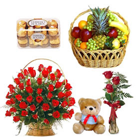 3 Red Roses Vase + Teddy + 3 Kg Fruits Basket + 16 Ferrero rochers + 30 Red Roses Basket