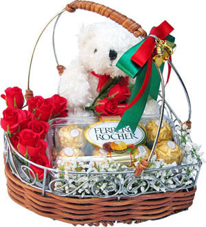 Teddy 16 ferero rocher and 12 red roses all in a basket