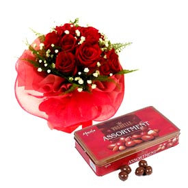 12 red roses + Box of Vochelle Chocolates