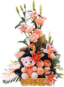 Basket Arrangement of Lilium and other Exotic Flowers with a Teddy Bear
