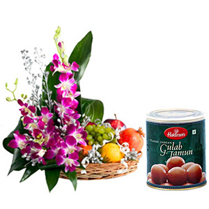 Hamper of Fresh Fruits with 1/2Kg Rasgulla 6 orchids