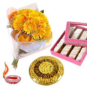 1/2 kg Dry fruits with 1/2 kg kaju katli and 12 gerberas