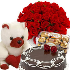 12RedFlowers+Teddy+16 Pieces Ferrero Rocher+1/2 Kg Cake