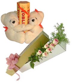 2 teddies Toblerone chocolates and 6 pink Roses